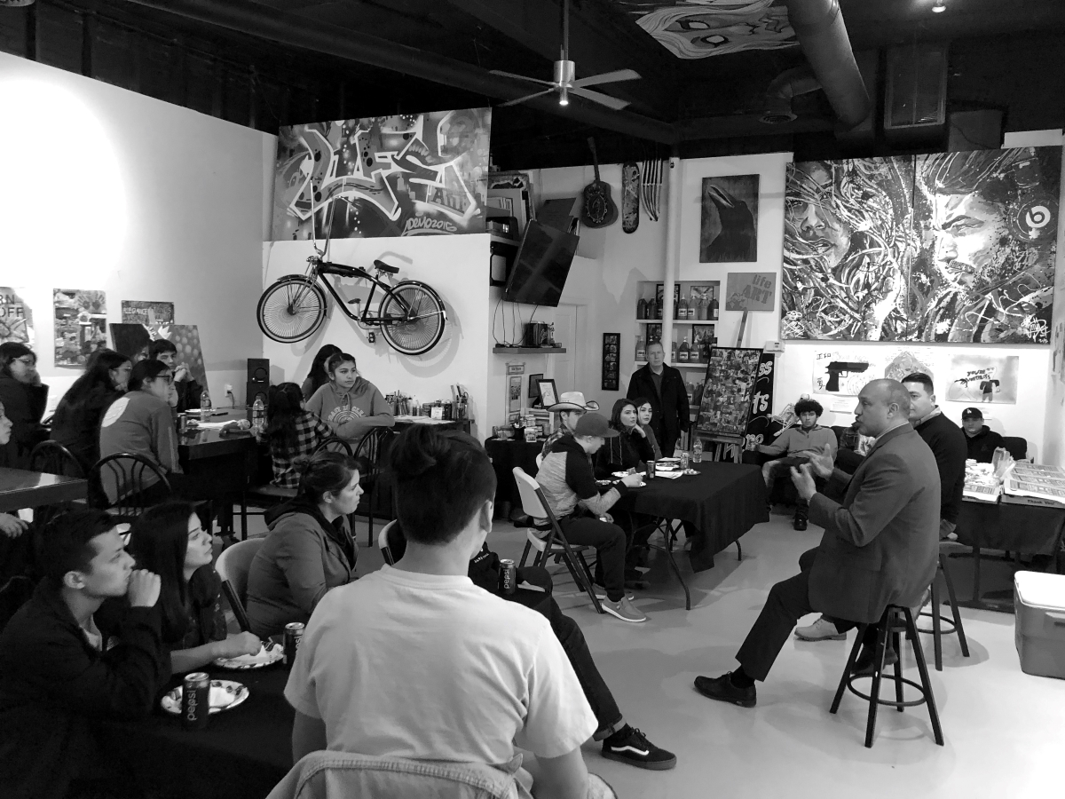 Community meeting at a local gallery